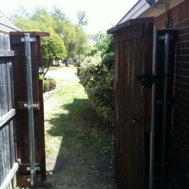 Wood Gate with Metal Frame open DFW Fence Contractor